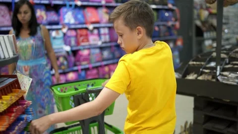 Boy shopping to school Stock Footage 135987462