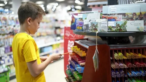 Boy shopping to school Video stock 137262460