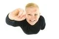 The boy show two finger to the camera. View from above Photo