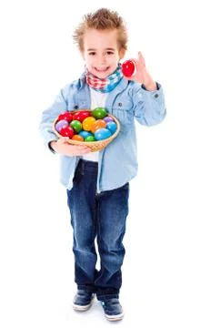 Boy showing an red Easter egg Stock Photos