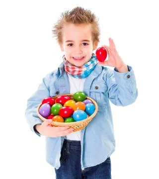 Boy showing an red Easter egg Stock Photos