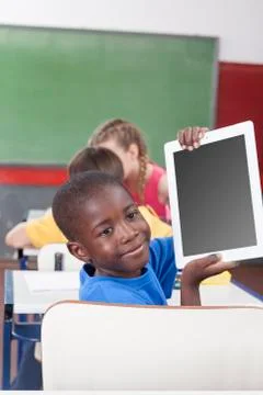 Boy showing the tablet Stock Photos