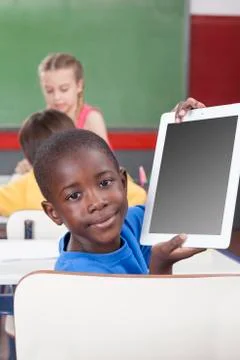 Boy showing the tablet Stock Photos