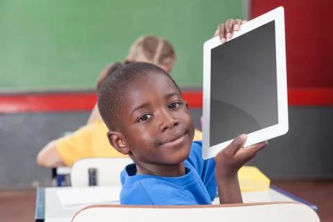 Boy showing the tablet Stock Photos