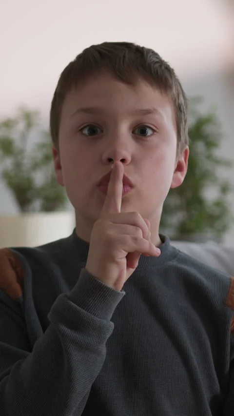 Boy Shushing Gesture 库存影片 335487356