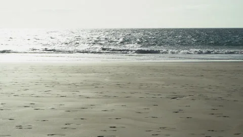 Boy Silhouette Diving in the Streams of the Ocean, Filmed in Backlight Stock Footage 197610923