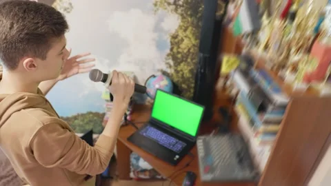 Boy singing in his room Stock Footage 188923647