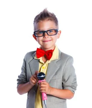Boy singing with a microphone Photos