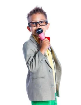 Boy singing with a microphone Foto stock