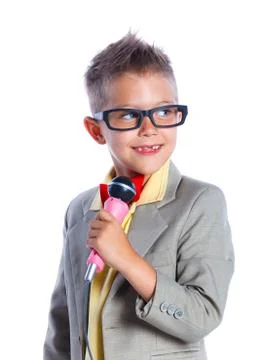Boy singing with a microphone 写真素材