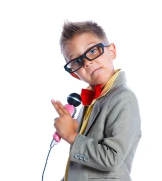 Boy singing with a microphone Foto stock