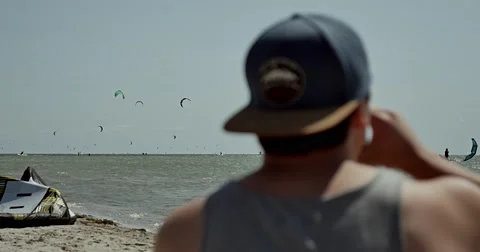 A Boy Sitting On The Beach 4k Stock Footage 51096271