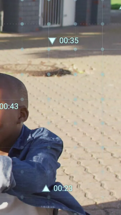 Boy sitting on bricks reaching for item starting HUD timecodes charts animating Stock Footage 334319120
