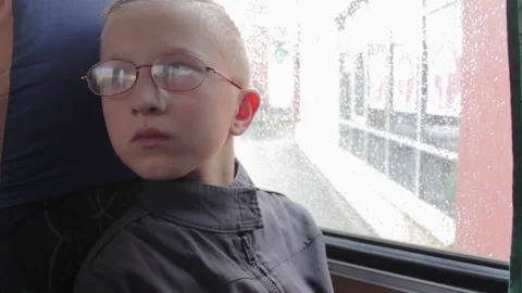 Boy is sitting in the bus Stock Footage 234183194