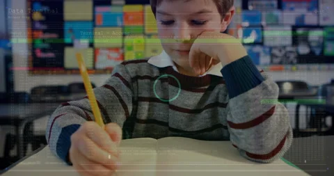Boy sitting at desk writing in classroom, with code and dot-matrix overlays Stock Footage 307946838