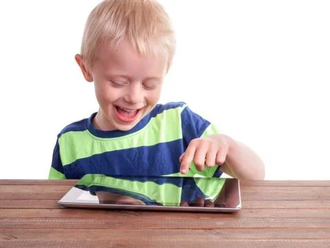 Boy sitting with Digital Tablet Stock Photos