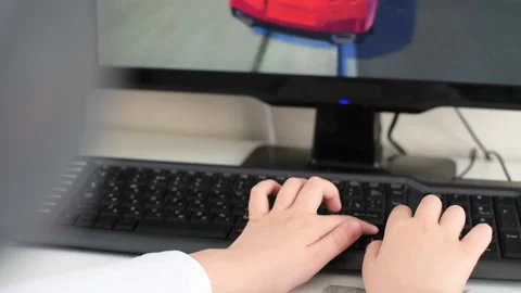 Boy sitting in front of computer, childs hands press the buttons on keyboard. Stock Footage 178417788