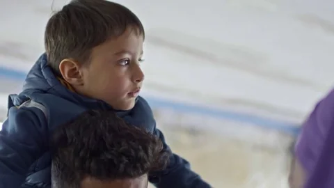 Boy Sitting on Shoulders of Arab Man Stock Footage 78738934