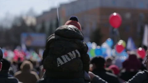 Boy sitting on the shoulders of a man Stock Footage 49659887