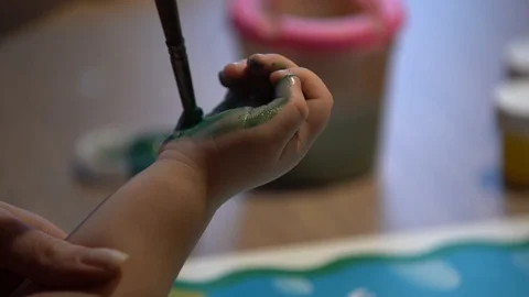 The boy is sitting at the table Stock Footage 104701947
