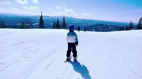 The boy on skis in mountains in slowmotion. Stock Footage 67443068
