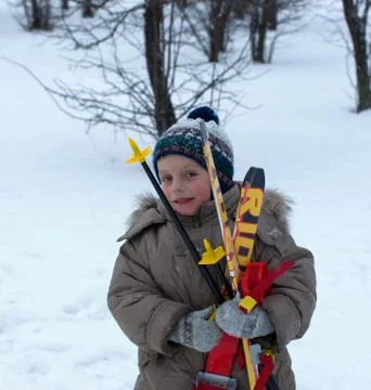 The boy with skis Stock Photos