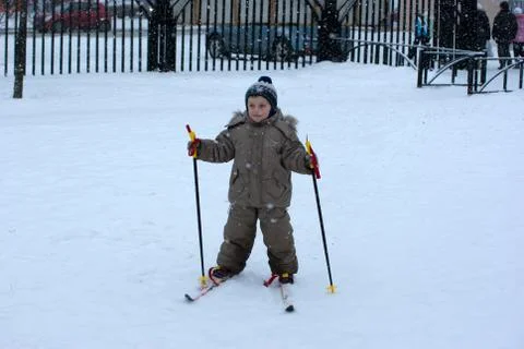 The boy on skis Stock Photos