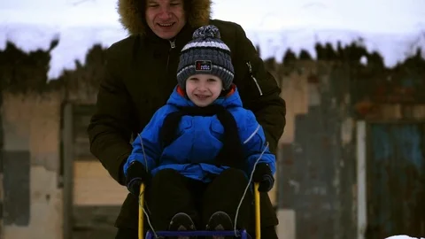 A boy is sledding slowmotion Stock Footage 85359729