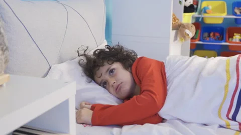 A boy with sleep problems can't sleep. Insomnia. Stock Footage 227673959