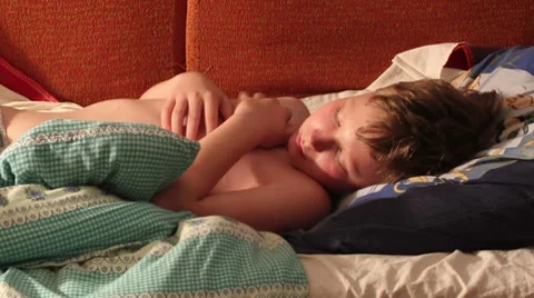 Boy sleeps Stock Footage 7751866