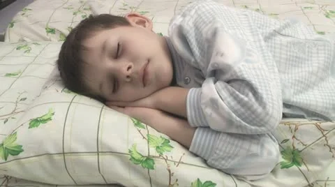 Boy sleeps in the nursery. Stock Footage 22075253
