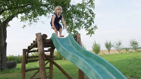 Boy Slide Alone Dirt - 4k - Slow motion Video stock 70447705