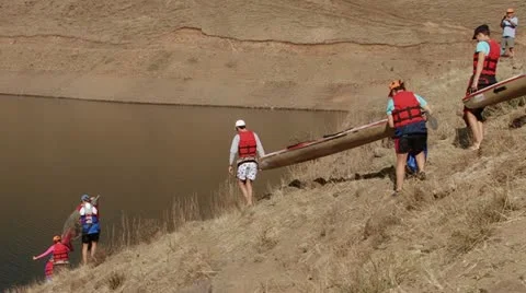 A boy slips and falls down the bank Stock Footage 12267300