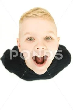 The boy smile to the camera. View from above Stock Photos