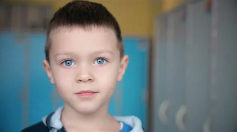 The boy is smiling at the camera Video stock 58630037