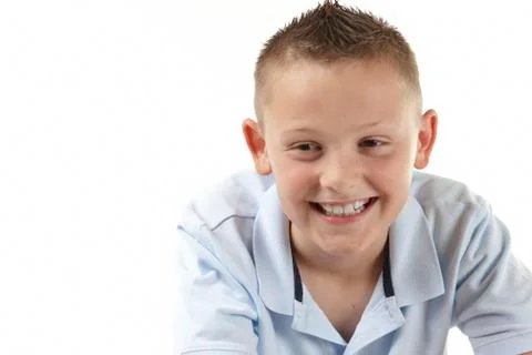 Boy smiling off camera Stock Photos