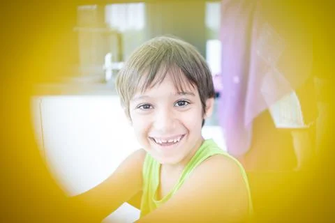 Boy smiling looking into camera closeup Foto stock