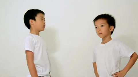 Boy sneeze to another unprotected boy and not happy 스톡 동영상 51802562