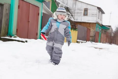 Boy on snow Stock Photos