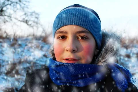 Boy in the snow. Stock Photos