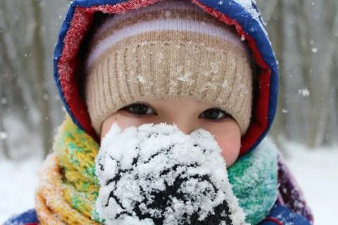 Boy in the snow. Stock Photos