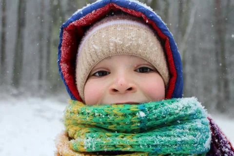 Boy in the snow. Stock Photos