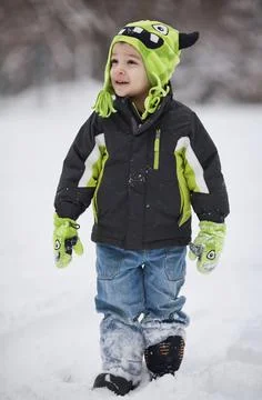 Boy in the snow Stock Photos