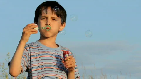 Boy with soap bubbles Stock Footage 840299