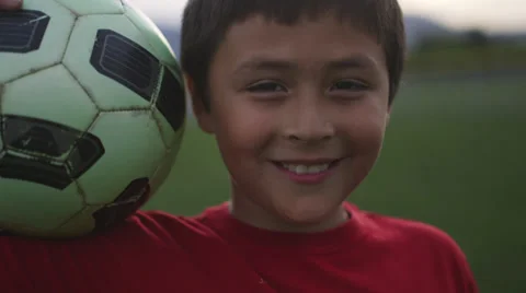 Boy with soccer ball smiling Stock Footage 37408391