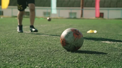 Boy soccer player kicks the ball Stock Footage 135018085