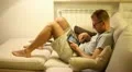 A boy on sofa with tablet HD Footage