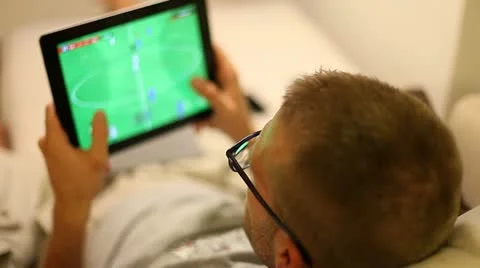 A boy on sofa with tablet Stock Footage 11236138