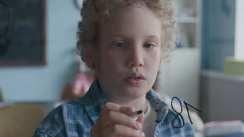 Boy Solving Division Problem at Glass Board During Math Lesson Stock Footage 312048481