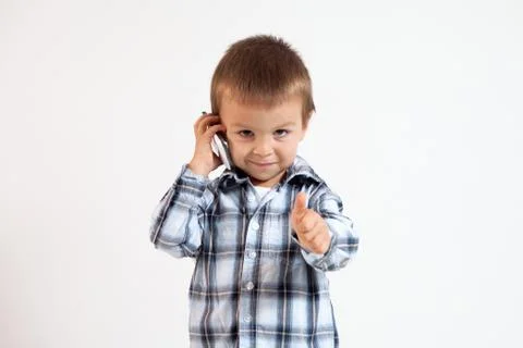 Boy, speaking on the phone Stock Photos